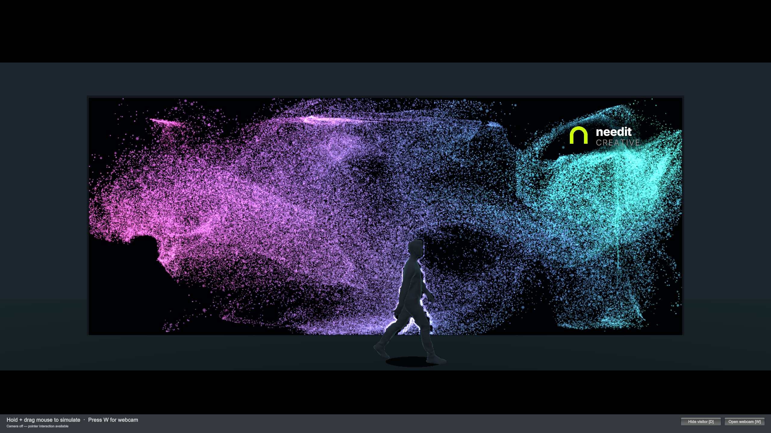 Magenta and teal particles flowing across the NEEDIT interactive LED wall preview