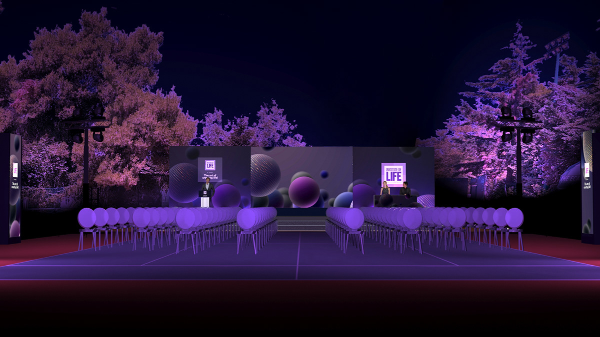 Institute of Life event environment lit in purple at night